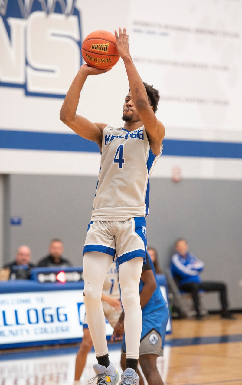 A men's basketball player competes during a home game.