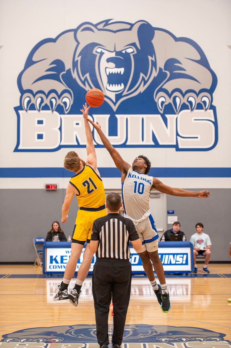Men's basketball players compete during a home game.